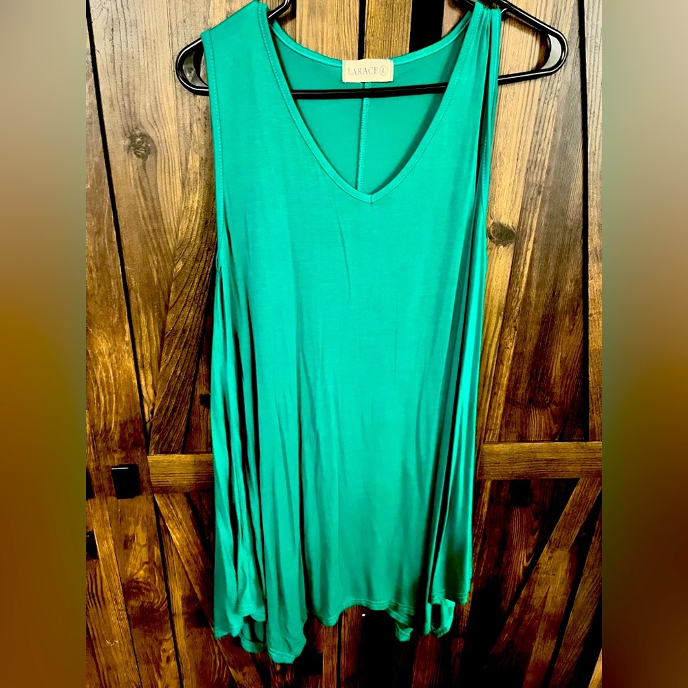 Large sleeveless green top